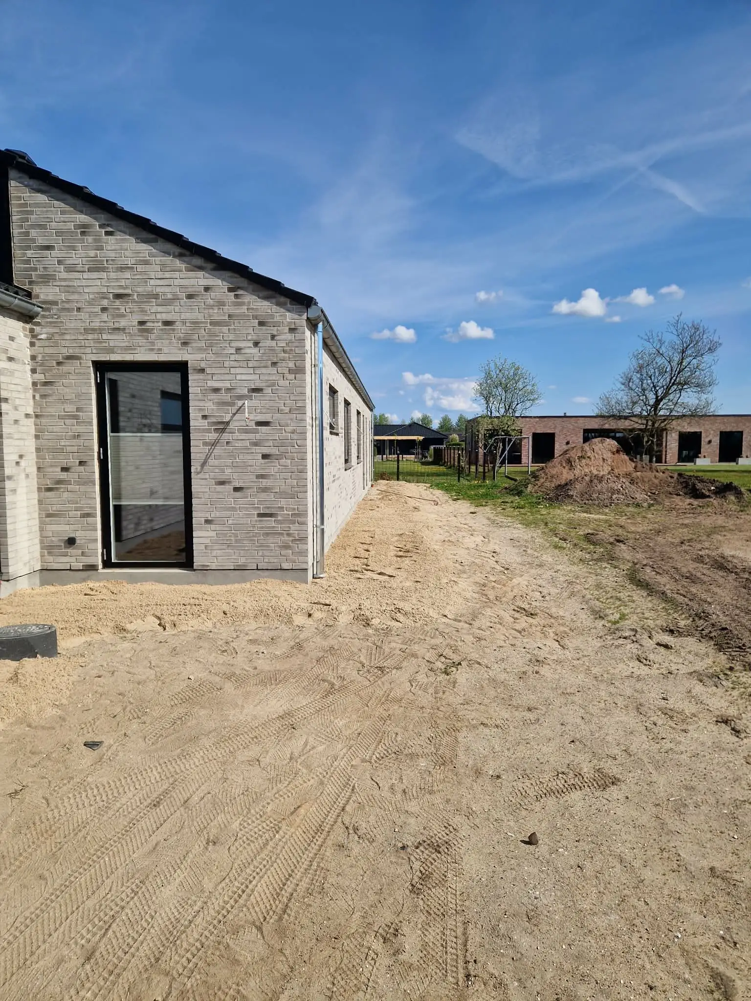 Planeret areal omkring nybygget hus